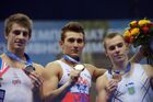 Британец Макс Уитлок, занявший второе место, россиянин Давид Белявский, занявший первое место, и украинец Олег Верняев, занявший третье место, (слева направо) на церемонии награждения призеров в личном многоборье среди мужчин на чемпионате Европы по спортивной гимнастике в СК "Олимпийский". Место: Россия, Москва. Автор: Григорий Сысоев/РИА Новости. Спортивная гимнастика. Чемпионат Европы. Многоборье. Мужчины