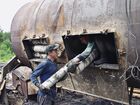 Рабочие во время процесса производства древесного угля в Ковернинском районе Нижегородской области. Место: Россия, Нижегородская область. Автор: Дмитрий Коробейников/РИА Новости. ДРЕВЕСНЫЙ УГОЛЬ ПРОИЗВОДСТВО