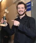 Актер позирует фотографу после IX церемонии вручения премии "Золотой орел". Г.Добрыгин, сыгравший в фильме "Как я провел этим летом" получил специальный приз как перспективный актер. Место: Россия, Москва. Автор: Екатерина Чеснокова/РИА Новости. Григорий Добрыгин