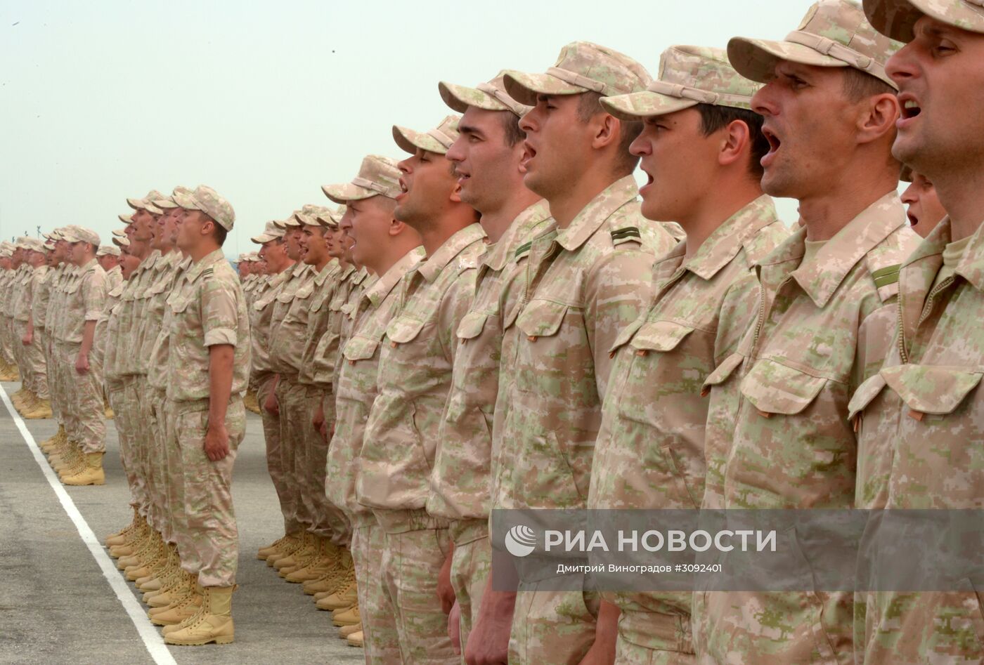 Репетиция парада Победы на авиабазе Хмеймим в Сирии. Место: Сирия. Автор: Дмитрий Виноградов/РИА Новости. Репетиция парада Победы на авиабазе Хмеймим в Сирии