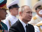 30 июля 2017. Президент РФ, верховный главнокомандующий Владимир Путин и министр обороны РФ Сергей Шойгу (слева) на Адмиралтейской набережной во время военно-морского парада по случаю Дня Военно-морского флота РФ в Санкт-Петербурге. Место: Россия, Санкт-Петербург. Автор: Сергей Гунеев/РИА Новости. Президент РФ В. Путин принимает участие в торжествах по случаю Дня ВМФ РФ
