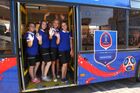 Волонтеры в брендированном автобусе с символикой чемпионата мира по футболу-2018 в Саранске. Место: Россия, Саранск. Автор: Юлия Честнова/РИА Новости. Презентация автобусов с символикой ЧМ-2018 по футболу в Саранске