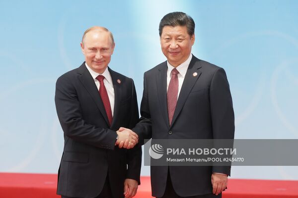 Официальный визит В.Путина в Китайскую Народную Республику