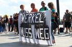 Участники акции протеста в Берлине против политики Ангелы Меркель. Место: Германия, Берлин. Автор: Николай Филяков. Акция протеста против политики Ангелы Меркель в Берлине