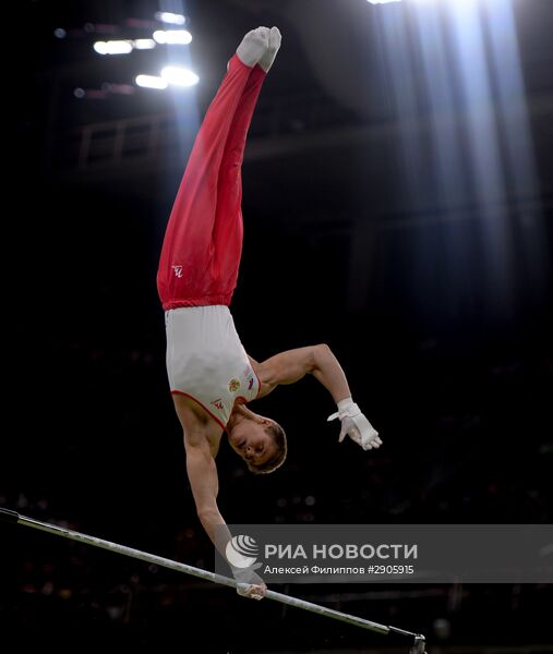 Олимпийские игры перекладина. Спортивная гимнастика перекладина мужчины.