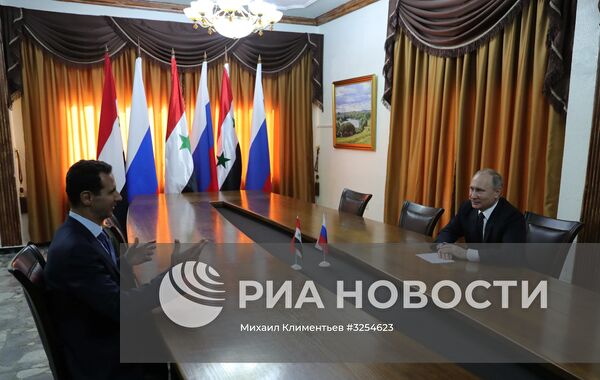 Президент РФ В. Путин посетил авиабазу Хмеймим в Сирии