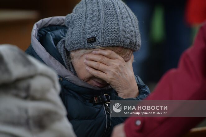 Родственница одного из пропавших без вести при пожаре в торговом центре «Зимняя вишня» в Кемерово. Место: Россия, Кемерово. Автор: Александр Кряжев/РИА Новости. Пожар в торговом центре «Зимняя вишня» в Кемерово