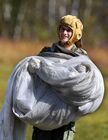 Воспитанник Уссурийского суворовского военного училища после первого прыжка с парашютом на полевом аэродроме у села Новосысоевка Приморского края. Место: Россия, Приморский край. Автор: Виталий Аньков. Десантирование воспитанников Уссурийского суворовского училища