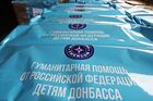 Груз 84-го гуманитарного конвоя МЧС РФ в Донецке. 84-й гуманитарный конвой из России доставил жителям Донбасса более 310 тонн гуманитарной помощи. В составе груза детские продуктовые наборы, новогодние подарки для детей, медицинское имущество. Место: Украина, Донецк. Автор: Сергей Аверин. Гуманитарный конвой из России прибыл в Донецк