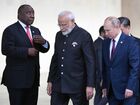 14 ноября 2019. Президент РФ Владимир Путин перед церемонией совместного фотографирования лидеров стран БРИКС во дворце "Итамарати". Слева направо - президент Южно-Африканской Республики (ЮАР) Сирил Рамафоза и премьер-министр Индии Нарендра Моди.
Место: Бразилия, Бразилиа. Автор: Рамиль Ситдиков. Президент РФ В. Путин на саммите БРИКС в Бразилии