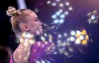 Российская спортсменка, член сборной России (команда ОКР) Ангелина Мельникова выполняет упражнения на перекладине в индивидуальном многоборье по спортивной гимнастике среди женщин на XXXII летних Олимпийских играх в Токио. Место: Япония, Токио. Автор: Алексей Филиппов/РИА Новости. Олимпиада-2020. Спортивная гимнастика. Женщины. Индивидуальное многоборье