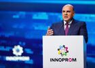 4 июля 2022. Председатель правительства РФ Михаил Мишустин выступает на главной стратегической сессии международной промышленной выставки "Иннопром-2022" на тему: "Промышленный переход: опыт лидеров" в МВЦ "Екатеринбург-Экспо". Место: Россия, Свердловская область, Екатеринбург. Автор: Дмитрий Астахов/РИА Новости. Рабочая поездка премьер-министра РФ М. Мишустина в Свердловскую область