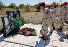 Участники военно-патриотического движения "Молодая гвардия - Юнармия" ДНР на памятном мероприятии по случаю 8-ой годовщины со дня гибели Андрея Стенина возлагают цветы у памятника российским журналистам, героически погибшим в ходе боевых действий в Донбассе 6 августа 2014 года: спецкору МИА "Россия Сегодня" Андрею Стенину, военкорам агентства "Icorpus" Андрею Вячало и Сергею Коренченкову, на месте их гибели в районе поселка Зрубное города Снежное в ДНР. Место: Донецкая народная республика, Снежное. Автор: Сергей Аверин/РИА Новости. Памятное мероприятие на месте гибели А. Стенина в ДНР