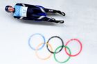 Российский спортсмен, член сборной России (команда ОКР) Роман Репилов на дистанции первого заезда соревнований по санному спорту среди мужчин на одноместных санях на XXIV зимних Олимпийских играх в Пекине. Место: Китай, Яньцин. Автор: Владимир Астапкович. Олимпиада-2022. Санный спорт. Мужчины