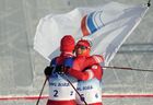 Слева направо: российский спортсмен, член сборной России (команда ОКР) Денис Спицов, завоевавший серебряную медаль и российский спортсмен, член сборной России (команда ОКР) Александр Большунов, завоевавший золотую медаль в забеге на 2x15 км скиатлона во время соревнований по лыжным гонкам среди мужчин на XXIV зимних Олимпийских играх 2022. Место: Китай, Чжанцзякоу. Автор: Павел Бедняков. Олимпиада-2022. Лыжные гонки. Мужчины. Скиатлон