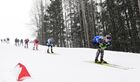 Спортсмены на дистанции масс-старта на 50 км свободным стилем в соревнованиях по лыжным гонкам среди мужчин на чемпионате России по лыжным гонкам в Сыктывкаре. Справа: Владимир Фролов. Место: Россия, Республика Коми, Сыктывкар. Автор: Павел Бедняков. Лыжные гонки. Чемпионат России. Мужчины. Масс-старт