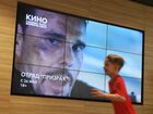 Мальчик в кинотеатре "Формула кино" в торговом центре "Фестиваль" в Москве. Генеральный директор киносети "Формула кино/Синема парк" Алексей Васясин заявил о проведении переговоров с владельцами торговых центров о возможном прекращении партнерства. Место: Россия, Москва. Автор: Кирилл Каллиников/РИА Новости. Кинозалы сети "Формула кино/Синема парк" могут закрыться в торговых центрах