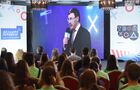 Экран с трансляцией выступления министра науки и высшего образования РФ Валерий Фалькова на презентации конкурса "Твой ход" в Донецке. Росмолодежь презентовала в Донецке и Луганске конкурс проектов "Твой ход" с главным призом 1 млн. рублей. "Твой ход" - первый масштабный конкурс для российских студентов. Он реализуется при поддержке Министерства науки и высшего образования РФ и Федерального агентства по делам молодёжи, входит в платформу АНО "Россия - страна возможностей". Место: Донецкая народная республика, Донецк. Автор: Сергей Батурин/РИА Новости. Презентация конкурса "Твой ход" в Донецке